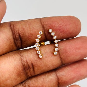 Gold-plated stud earrings with cubic zirconia stones, minimalist design