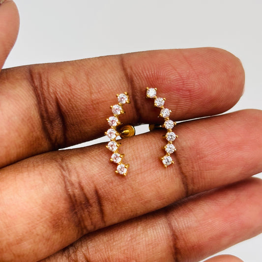 Gold-plated stud earrings with cubic zirconia stones, minimalist design