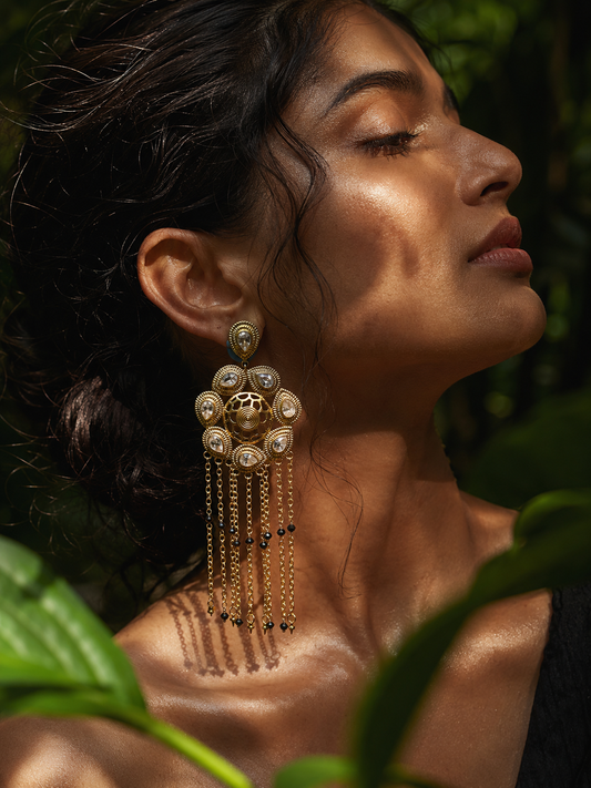 Gold-plated drop earrings with cubic zirconia stones, statement style