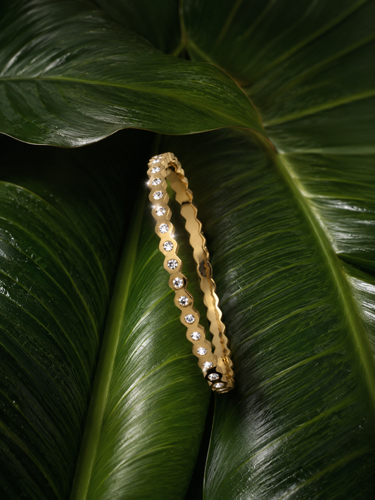Gold-plated multi-stone cuff bracelet with cubic zirconia, zigzag design